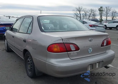 1999 Toyota Corolla Ce из США, поврежденный, VIN 2T1BR12E8XC103745